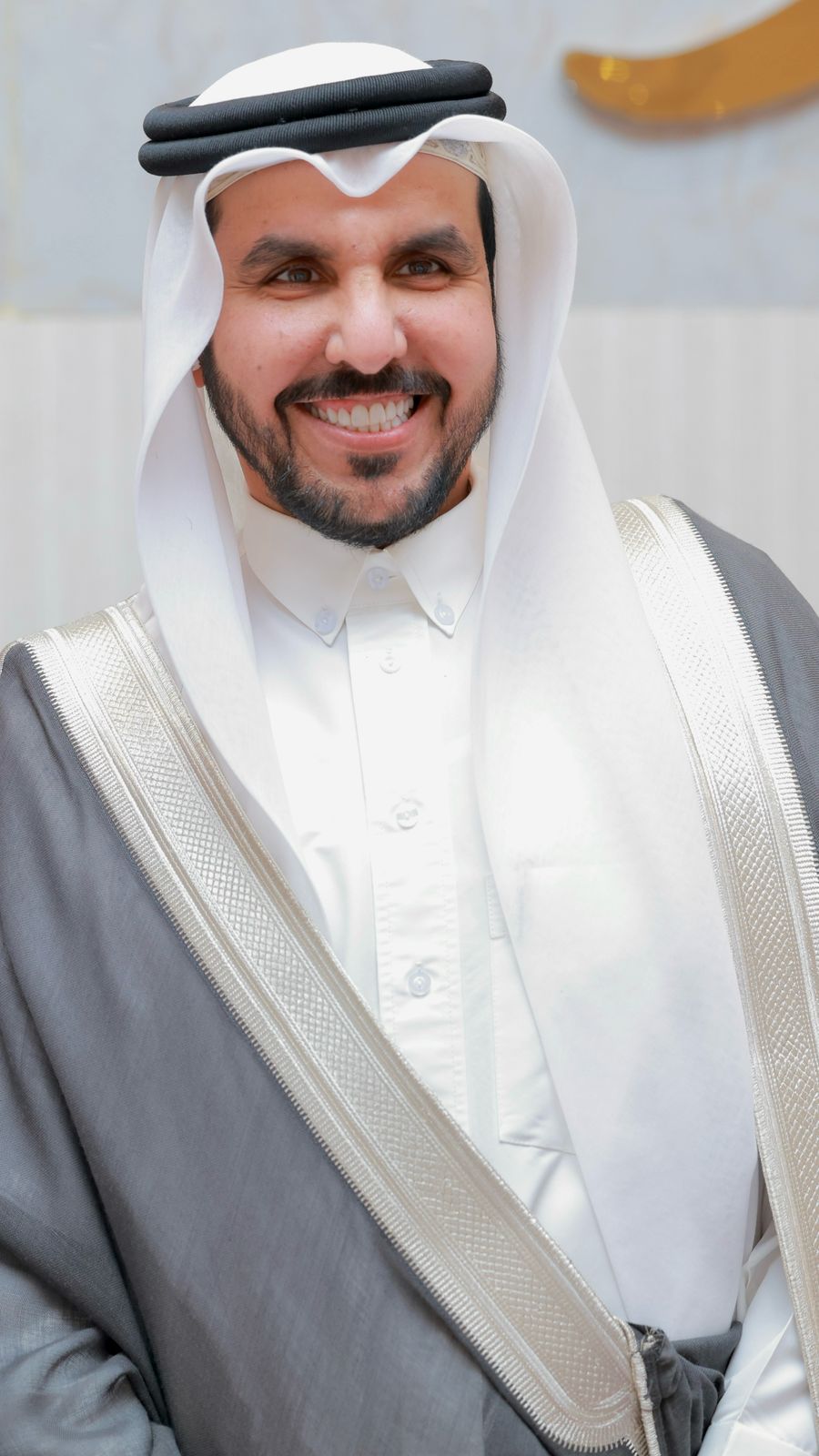 د. فهد بن نايف الفقير مبتسمًا في مناسبة رسمية